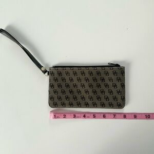 Dooney and Bourke Wristlet with Logo Pattern